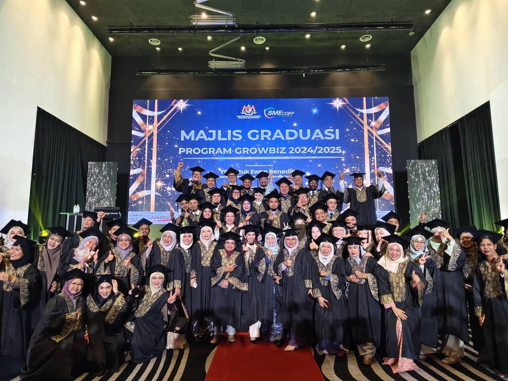 Entrepreneurs celebrating their graduation from the GrowBiz 2024/2025 Programme, marking their success in business growth and development.